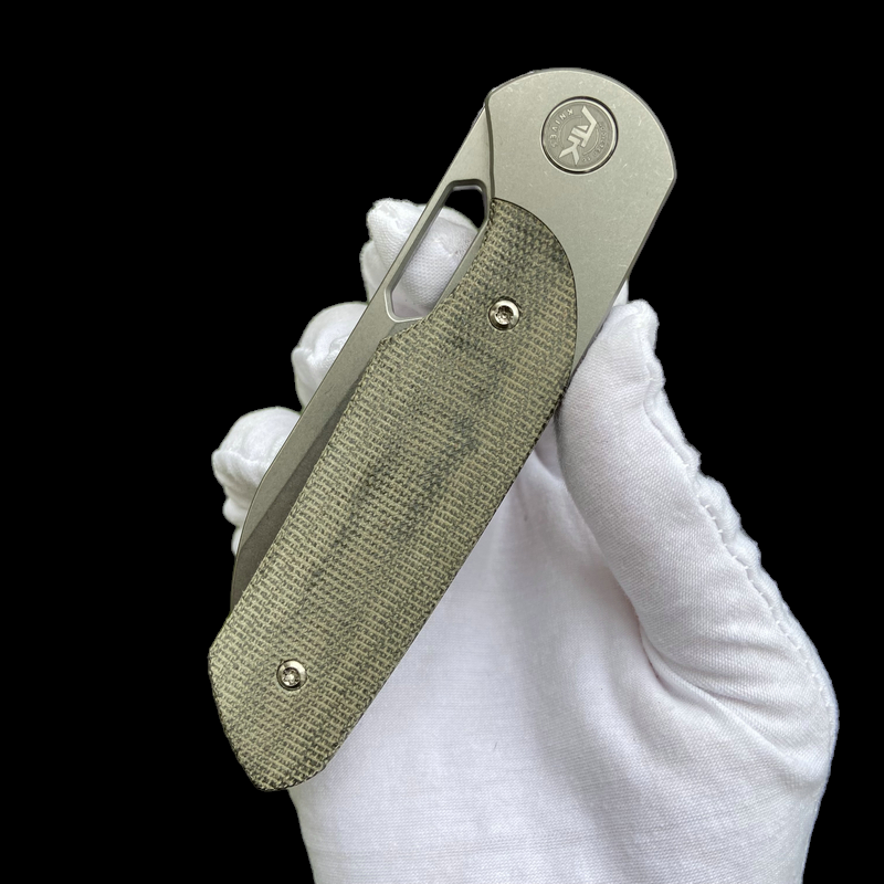 The H.A.L.T. Green Canvas Micarta